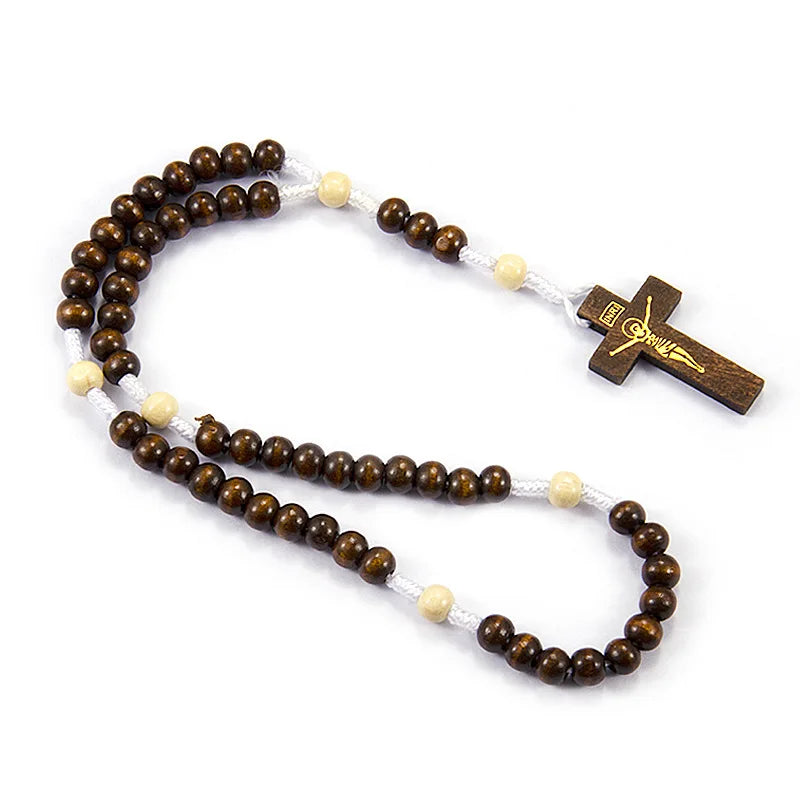 A wooden rosary beads necklace featuring a crucifix pendant.