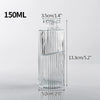 A tall, cylindrical clear glass bottle with vertical ridges, measuring 150ml.