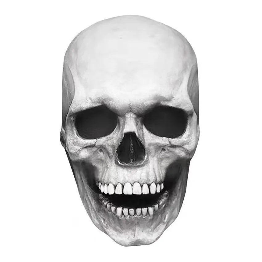 A realistic full-head skull mask with a movable jaw, shown in grayscale.
