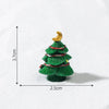A small, green resin Christmas tree charm with a gold star topper, shown against a white background.