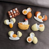 A set of kawaii food theme fridge magnets featuring various shapes like donuts, eggs, and a duck.