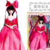 A pink princess ball-jointed doll with a red bow and flowing gown displayed in its packaging.