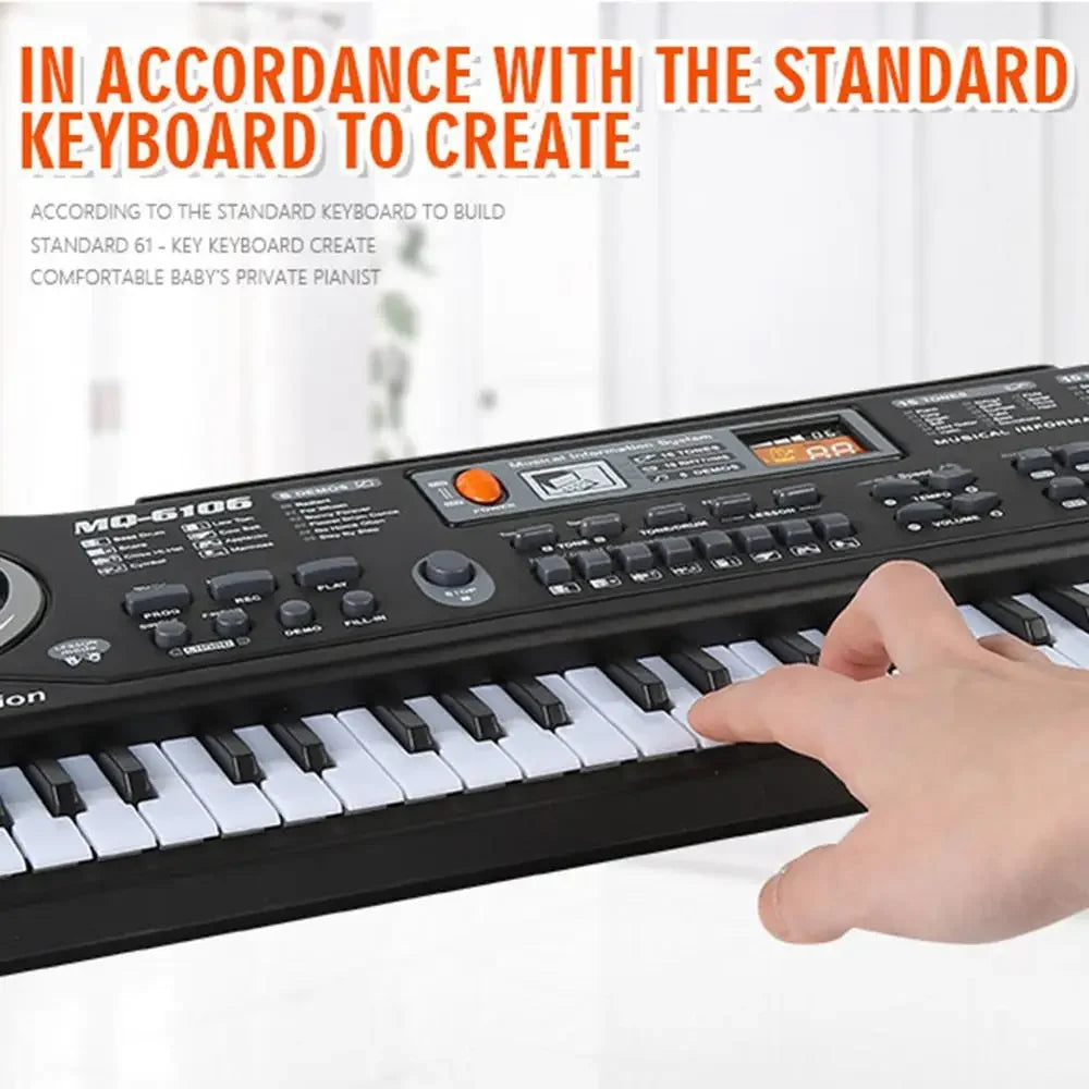 A close-up of a black electronic piano keyboard with a white key, being played by a hand.