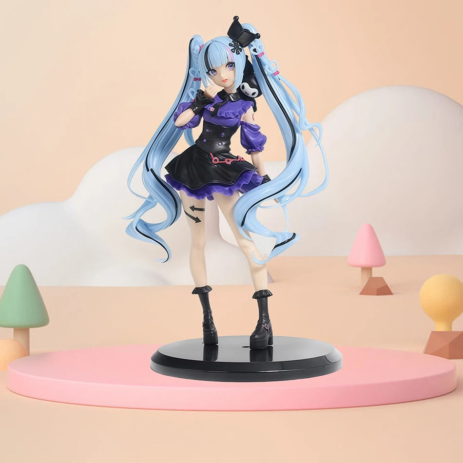 A detailed figure of a Gothic Lolita Miku action fairy doll with long light blue hair and a black outfit displayed on a pink 