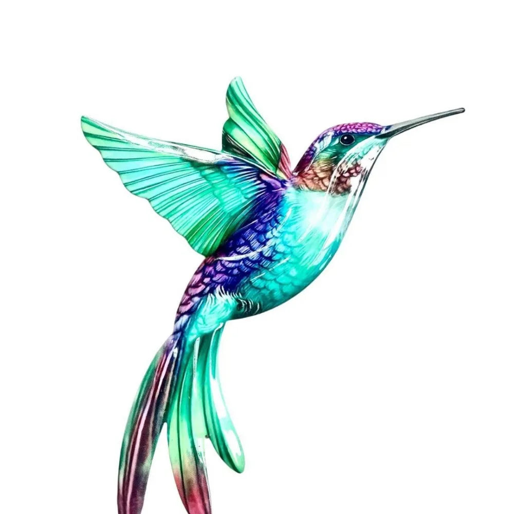 Vintage metal hummingbird wall art featuring iridescent green and purple plumage