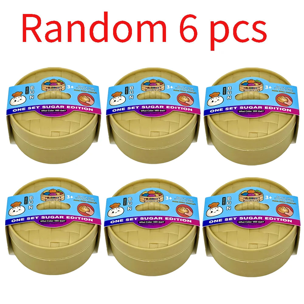 Six sets of colorful simulated dumpling squishy toys packaged in yellow containers