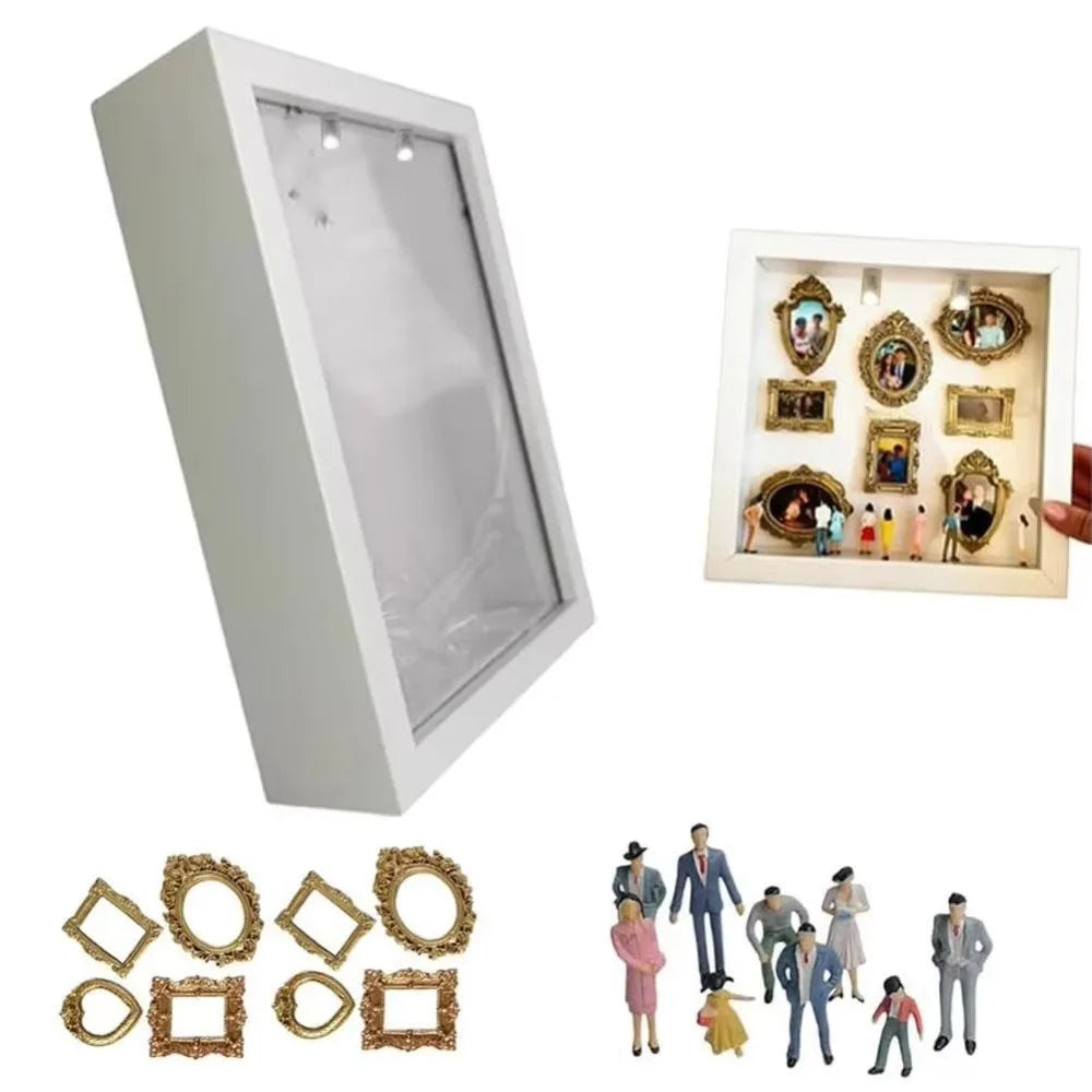 Weiße Dekoration, Erinnerungsbox mit Glas und mehreren goldgerahmten Fotos