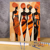 A painting by numbers kit showing an African woman portrait in orange and black tones.