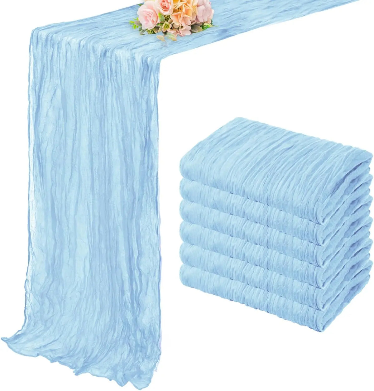 Light blue semi-sheer cheesecloth table runner set with pink floral arrangement