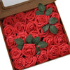 A box filled with bright red lifelike foam roses for wedding and home décor.