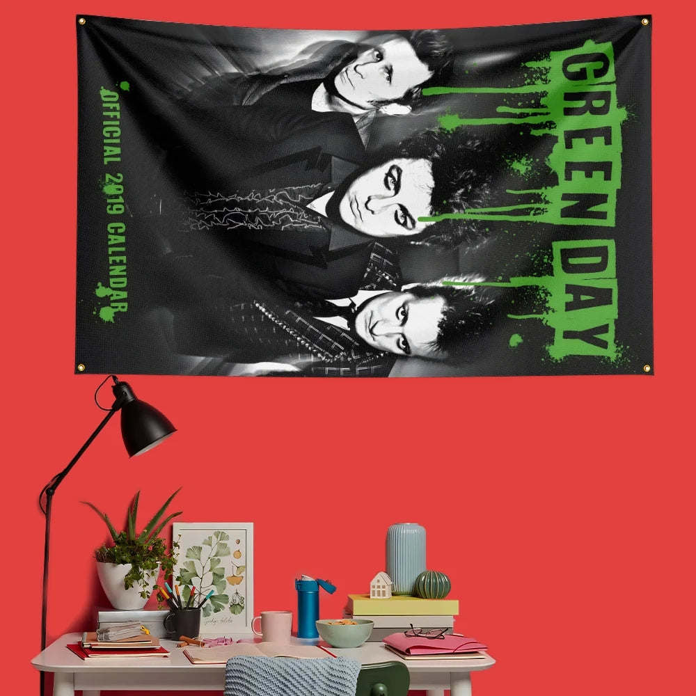 A black banner featuring multiple close-up portraits of Green Day members and the text GREEN DAY DAY in bright green font.