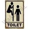 Vintage metal sign indicating a toilet facility with silhouette figures.