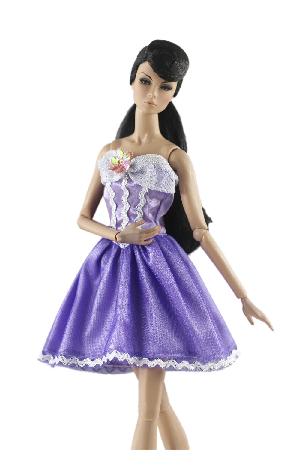 A handmade doll dress gown featuring a purple skirt and white floral bodice for an 11.5-inch doll.
