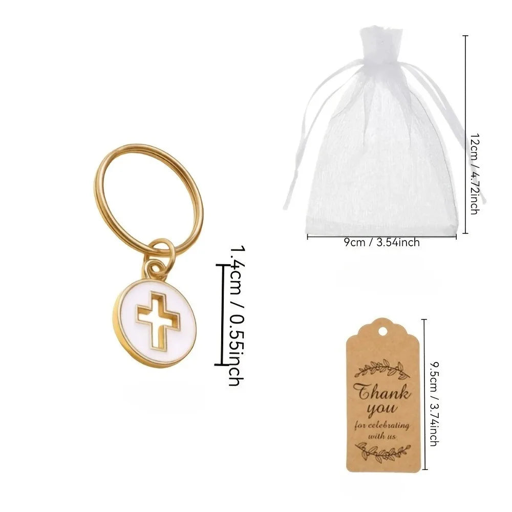 Gold cross keychain with a thank you card attached to an organza drawstring bag