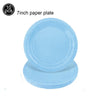 Ten 7 inch disposable paper plates in a light blue color stacked together