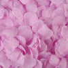 A close-up of pink artificial silk rose petals piled together.