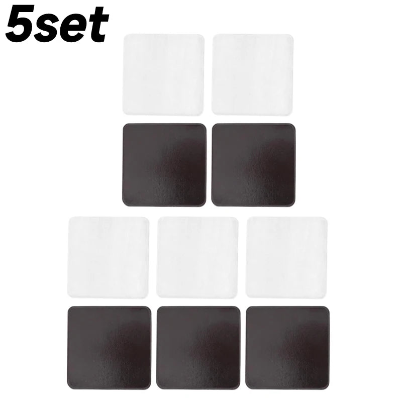 A set of five square acrylic fridge magnets in white and black.