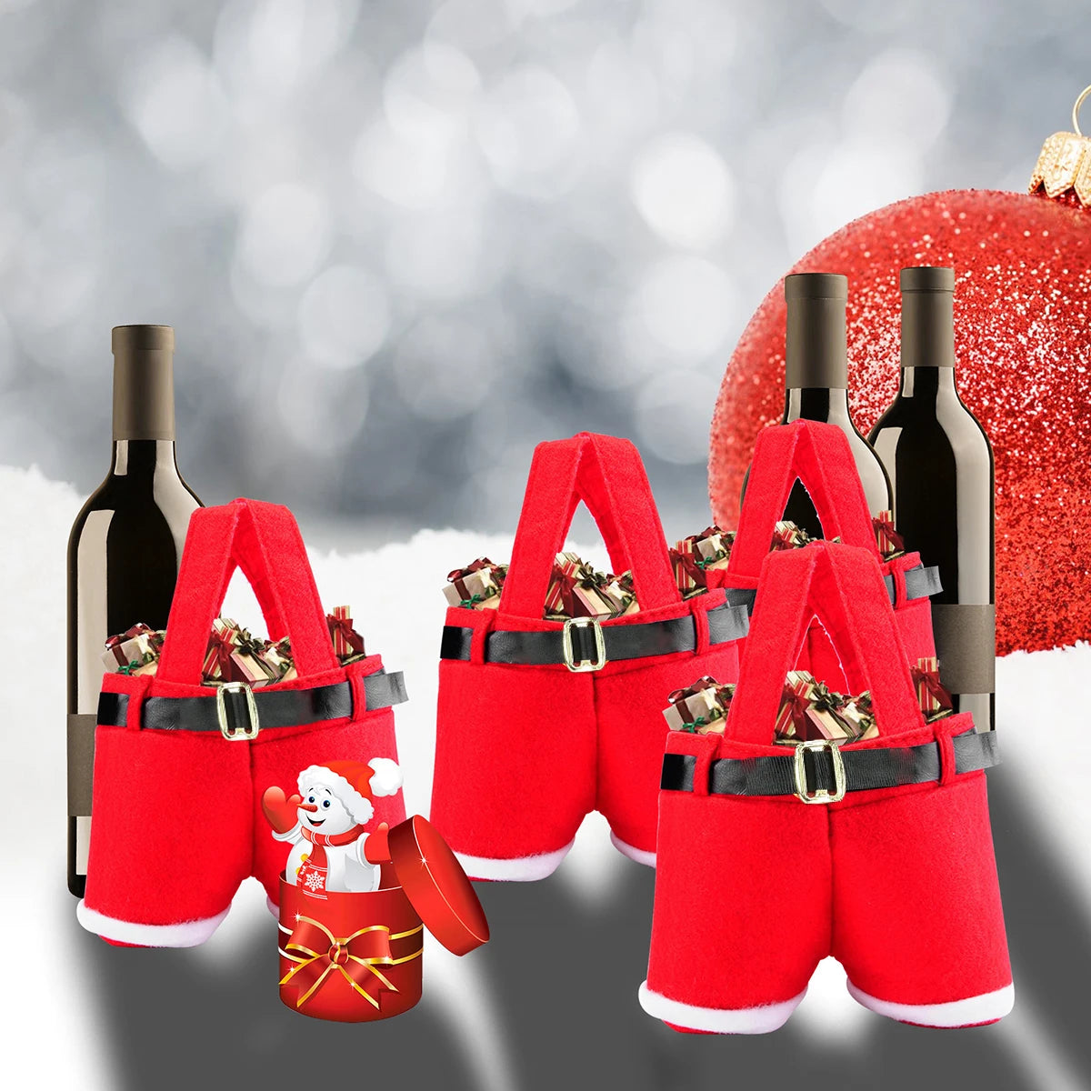 A set of six festive red Santa Claus gift bags with gold buckles and Christmas ornaments displayed against a blurred backgrou