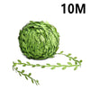 A spherical arrangement of artificial green climbing vine used for home decor.