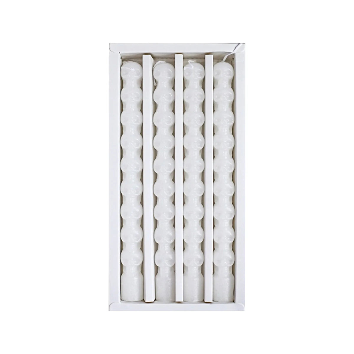 A white box containing a set of four taper candles designed to simulate dripping blood effect.