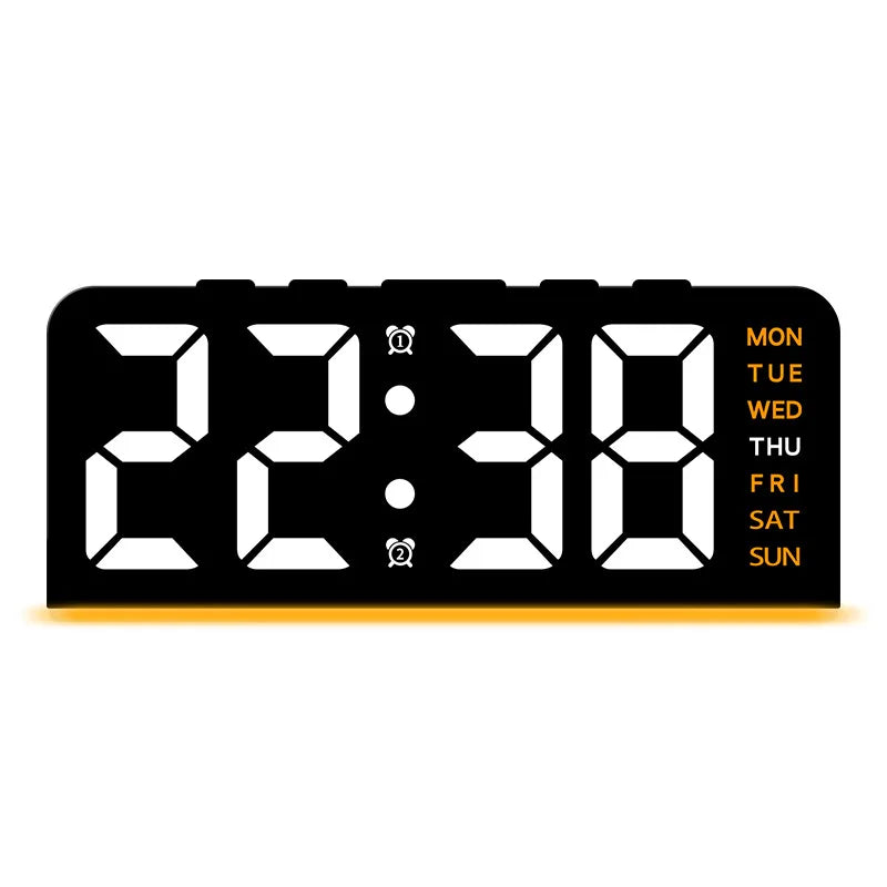 A black digital alarm clock displaying 22:38 with a seven-day display on the right side.