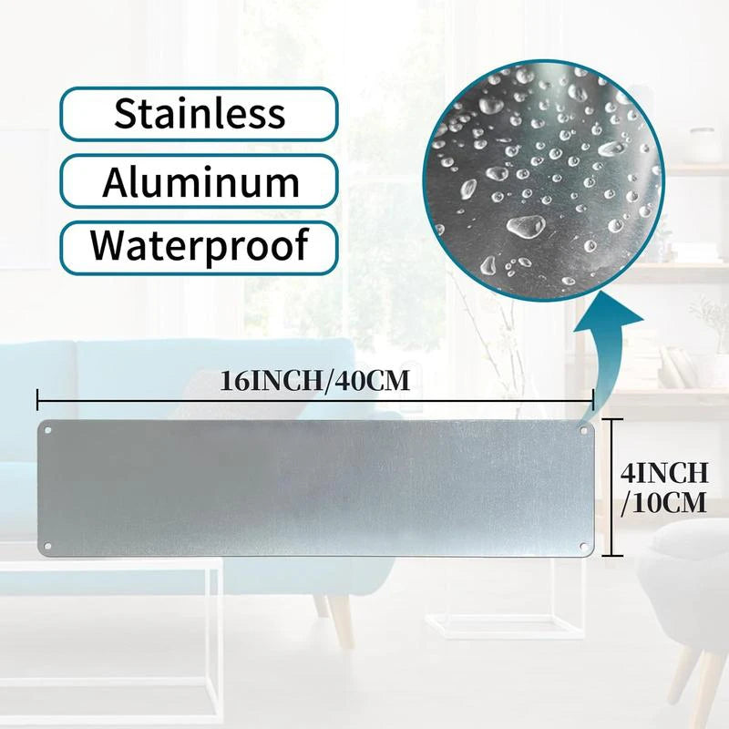 A rectangular stainless aluminum waterproof metal sign with a 4 inch height and 16 inch width, shown next to a blue sofa.