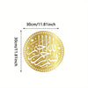 Gold metal wall art featuring Arabic calligraphy of Bismillah