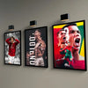 A framed canvas art poster featuring a dramatic close-up of Cristiano Ronaldo celebrating with intense emotion.