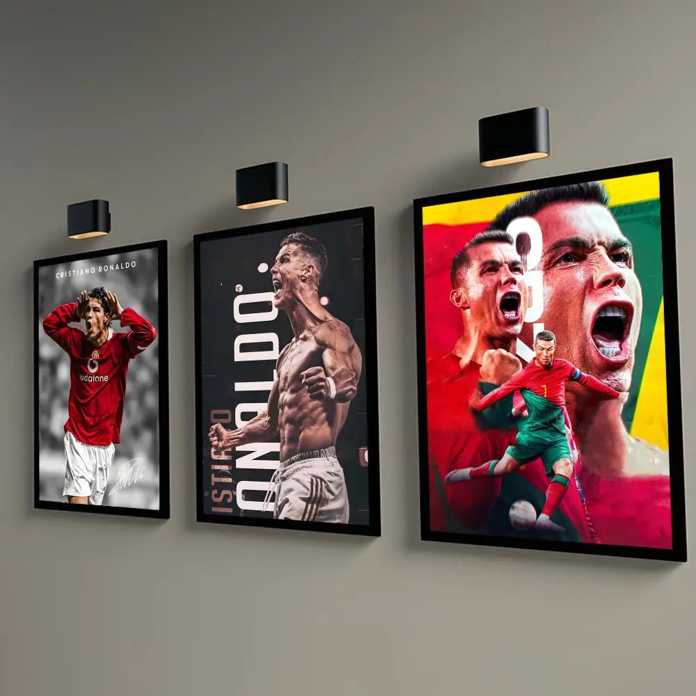A framed canvas art poster featuring a dramatic close-up of Cristiano Ronaldo celebrating with intense emotion.
