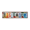 Vintage metal tin sign with the text BIG DADDY featuring various colors and numbers.