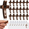A set of handcrafted black walnut crosses for prayer and meditation displayed on a white cloth.