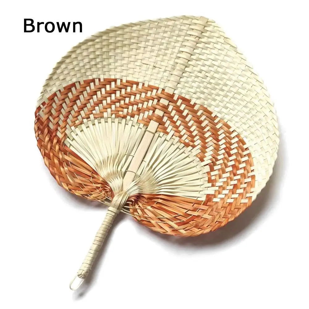 Brown peach-shaped bamboo woven hand fan with a light natural color and visible weaving pattern