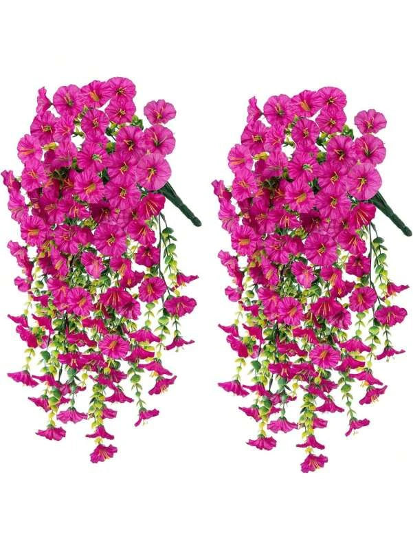 A vibrant arrangement of pink and magenta artificial morning glory vines used for home decor.