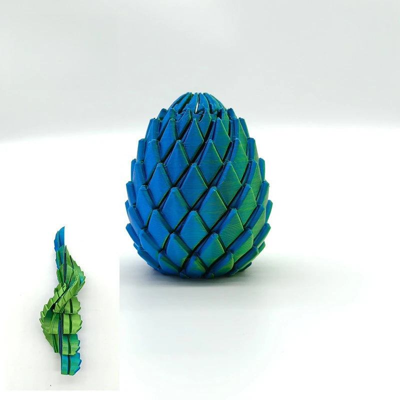 A vibrant blue dragon egg fidget toy with a textured, scale-like surface.