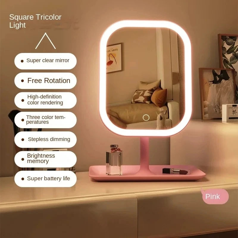 A pink smart LED makeup vanity mirror with a circular light frame and a reflective surface.