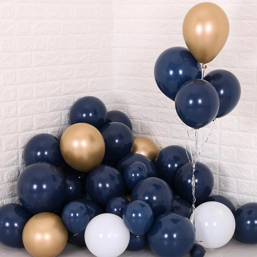 A cluster of luminous blue and gold latex balloons against a white textured background.