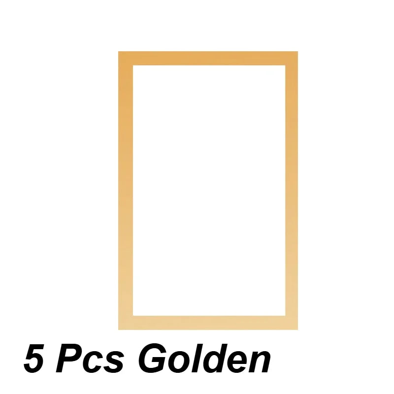 A set of five wooden photo frames with gold accents.