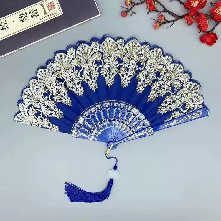 A blue and silver folding fan with intricate traditional Chinese floral design.