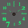 A gray clock face with light green hour markers and hands pointing to approximately 12:00.
