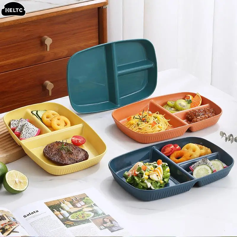 A set of three colored, compartmentalized portion control plates for balanced meals.