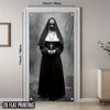 A 2D flat printing of a creepy nun in a black habit framed as a door banner.