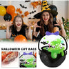 A black Halloween witch bag featuring a green slime pumpkin design with bats and skulls.