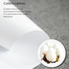 A close-up of white cotton canvas material with fluffy white fibers.