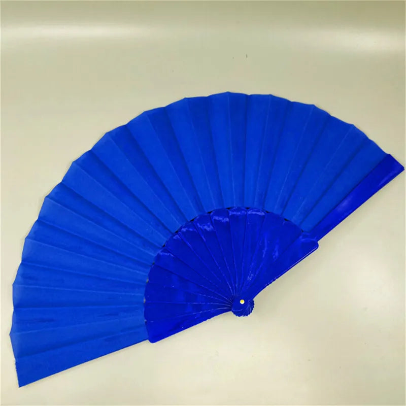 A vibrant royal blue lace folding hand fan with radiating pleats.