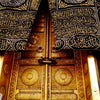 Gold-framed Islamic mosque canvas wall art featuring calligraphy of the Kaaba and Al Masjid An Nabawi.