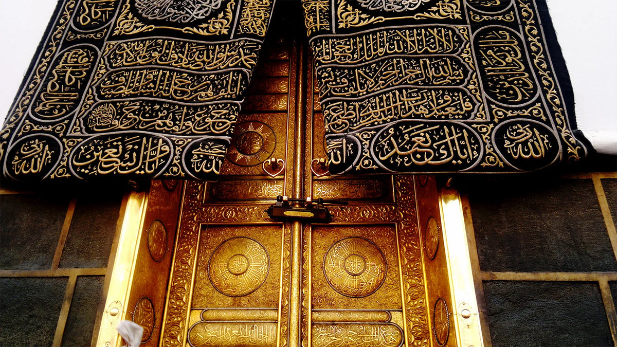 Gold-framed Islamic mosque canvas wall art featuring calligraphy of the Kaaba and Al Masjid An Nabawi.