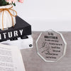 A clear acrylic desk plaque shaped like a fist bump for a brother with engraved text
