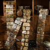 A collection of decorative washi tape in various patterns and colors displayed on wooden shelves.