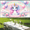A magical pink unicorn backdrop featuring a unicorn with a rainbow background and balloons for a birthday party.