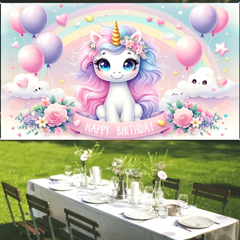 A magical pink unicorn backdrop featuring a unicorn with a rainbow background and balloons for a birthday party.